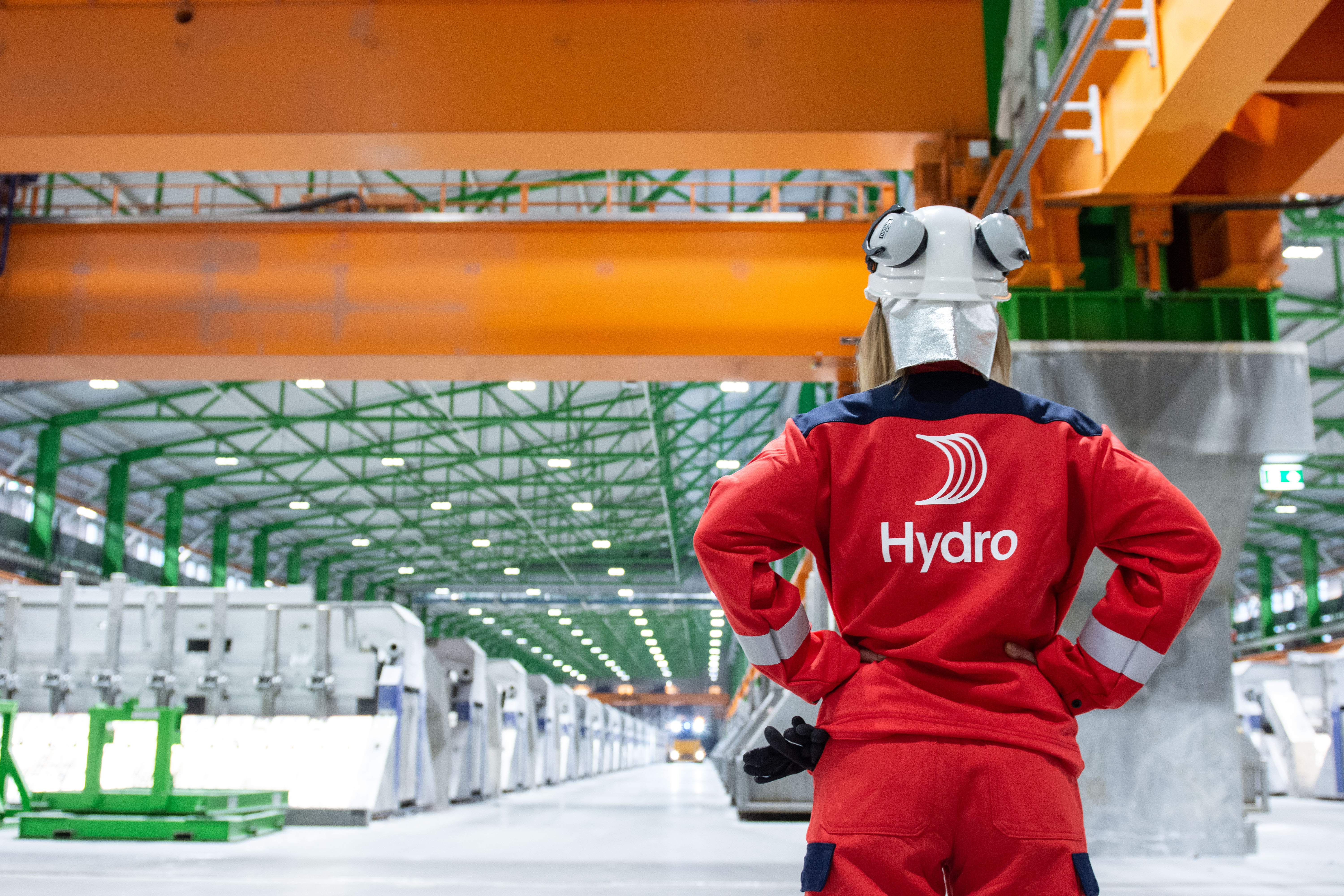 Employee looking at electrolysis hall