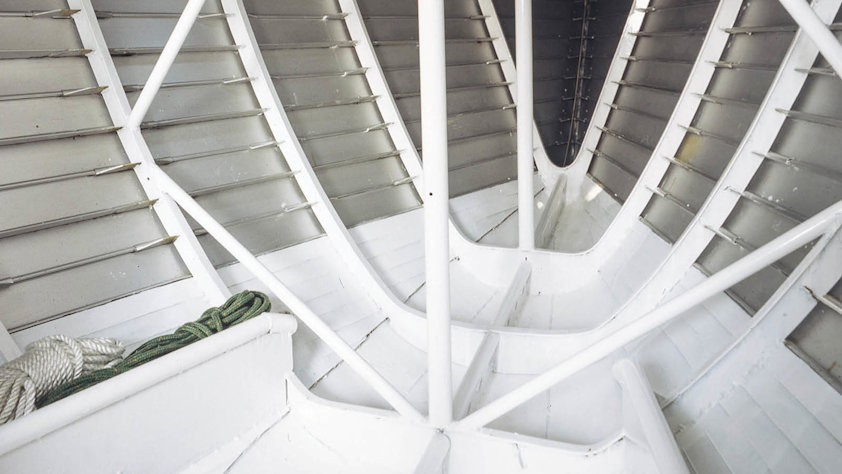 a close-up of a white staircase