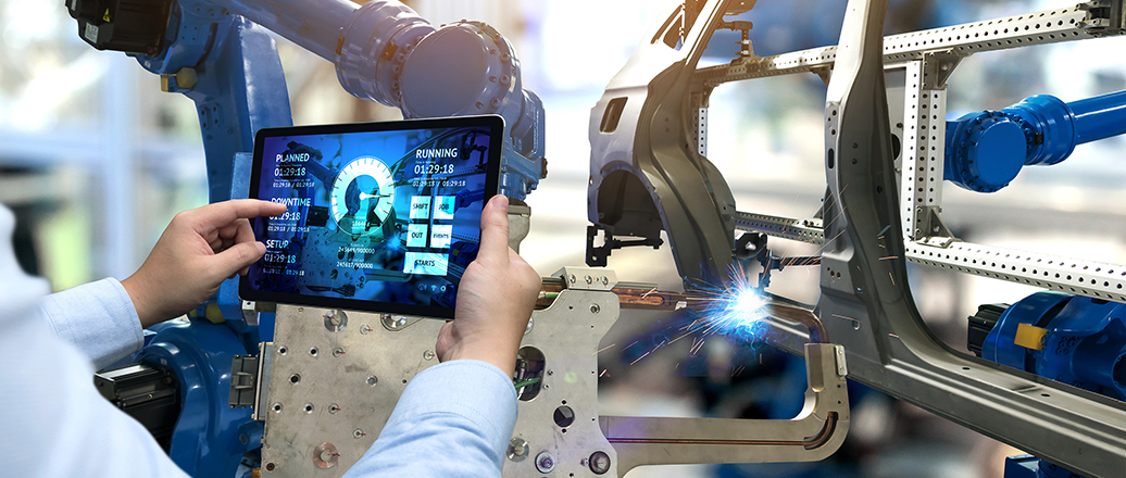 a tablet being operated at a car manufacturing plant