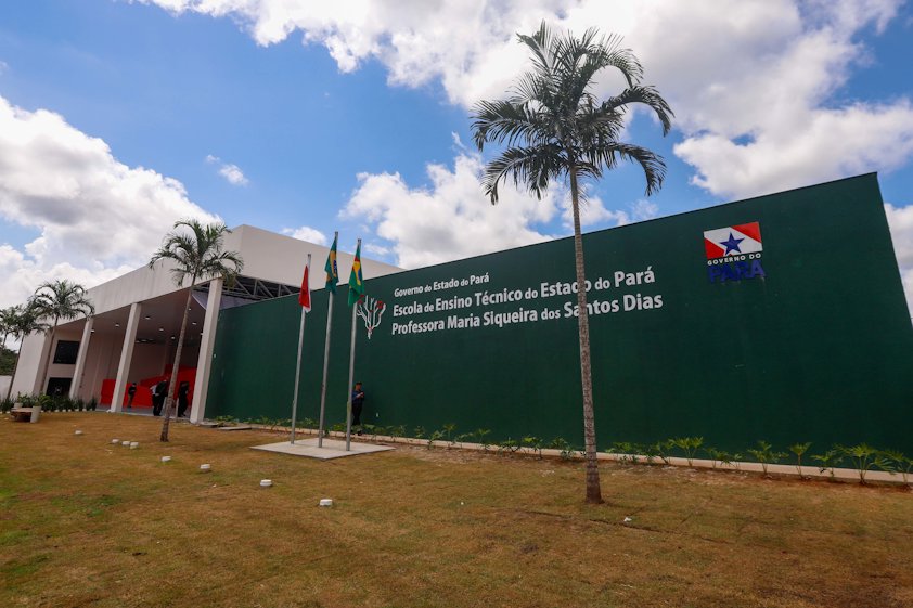 a green building with flags