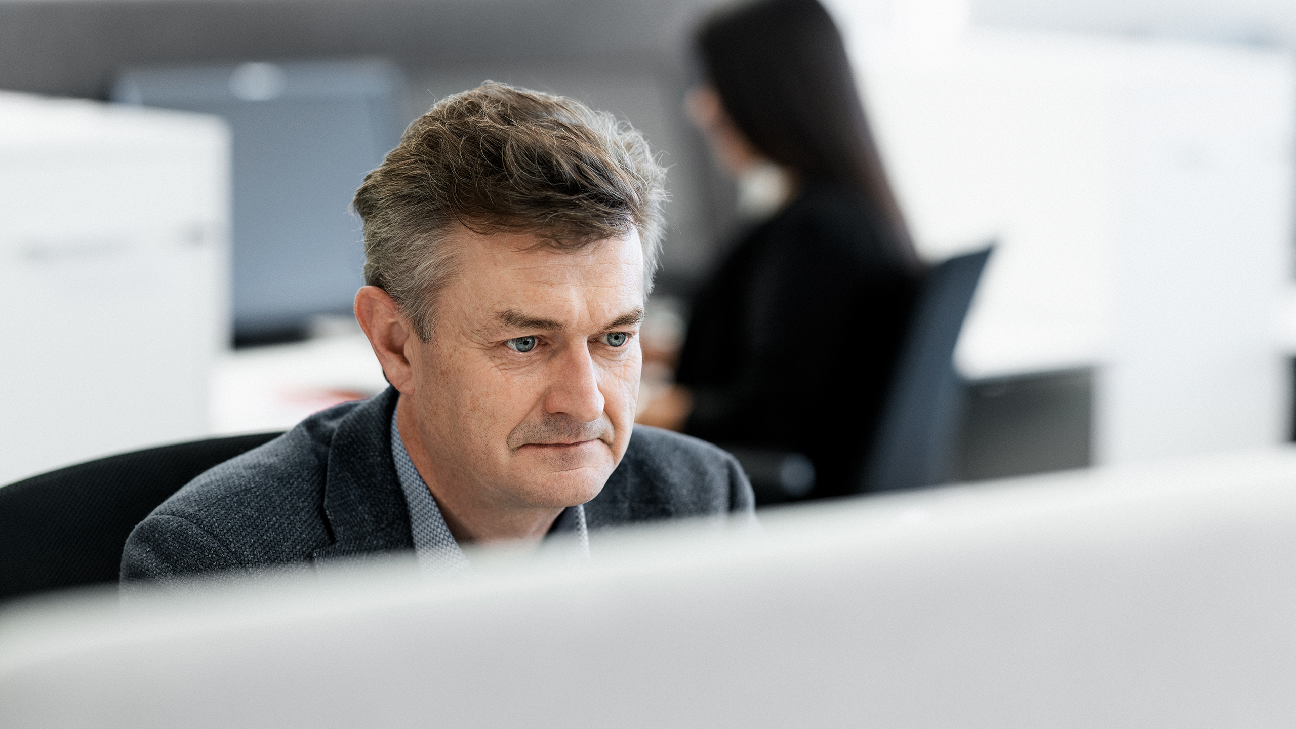 a man sitting at a desk