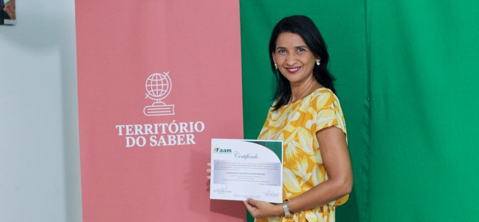 a woman holding a certificate