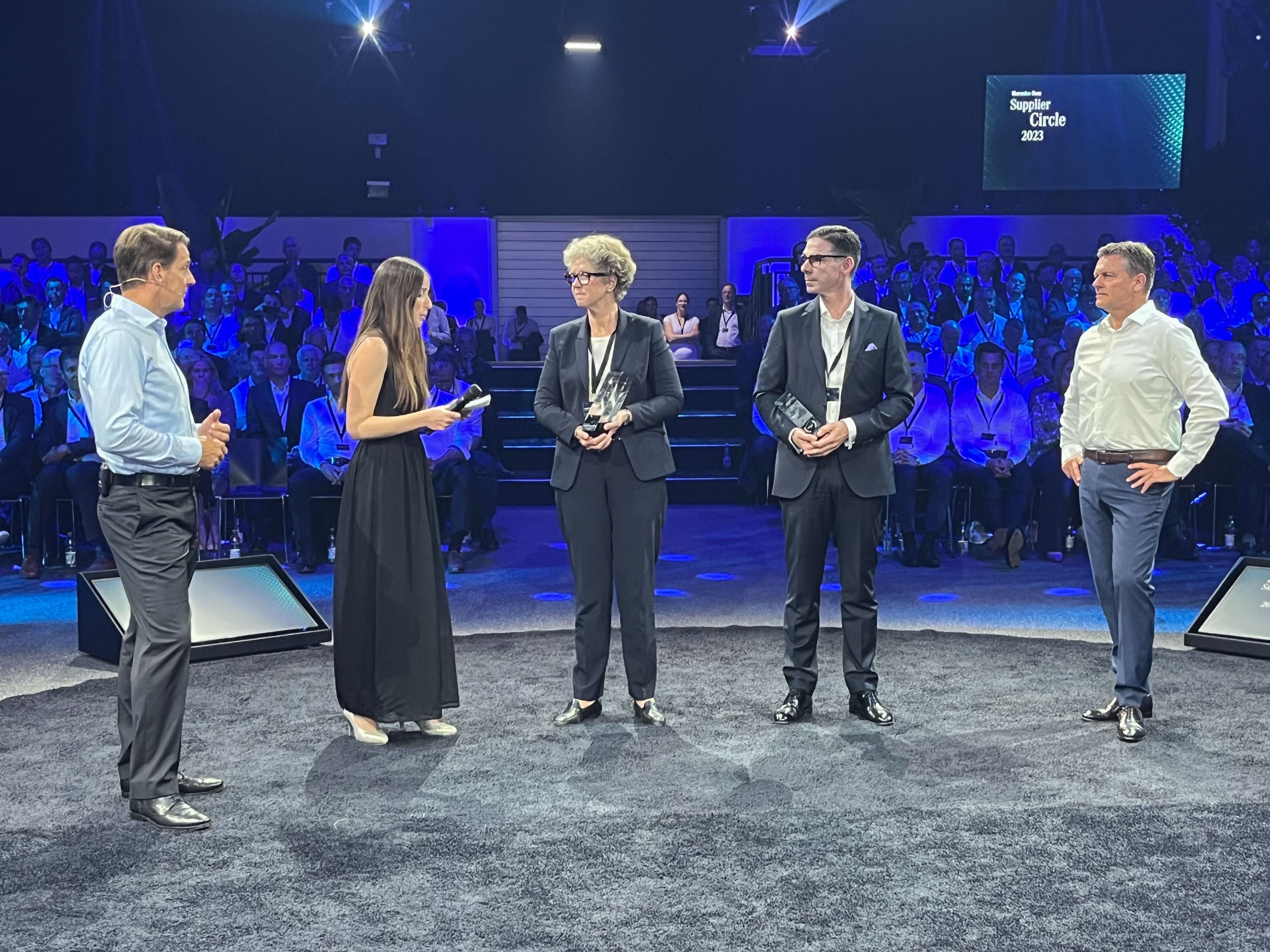 a group of people on a stage