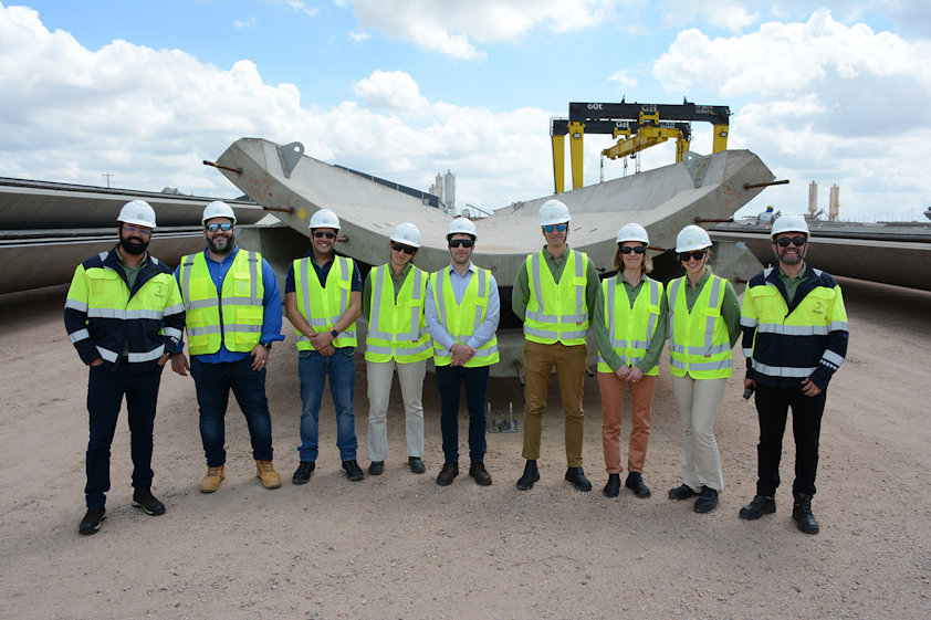 a group of people wearing safety vests
