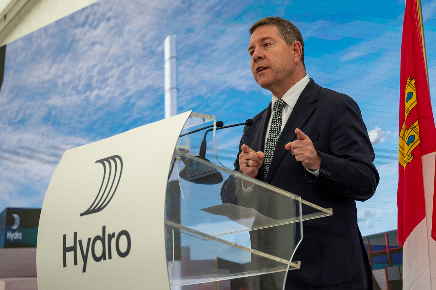 a man speaking at a podium