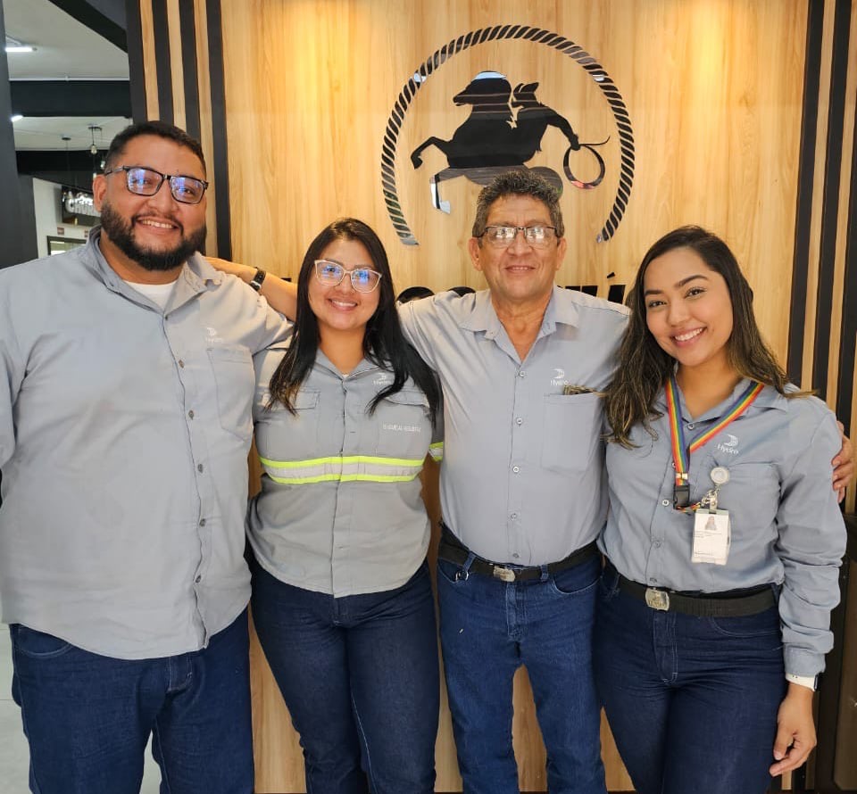 a group of people posing for a photo