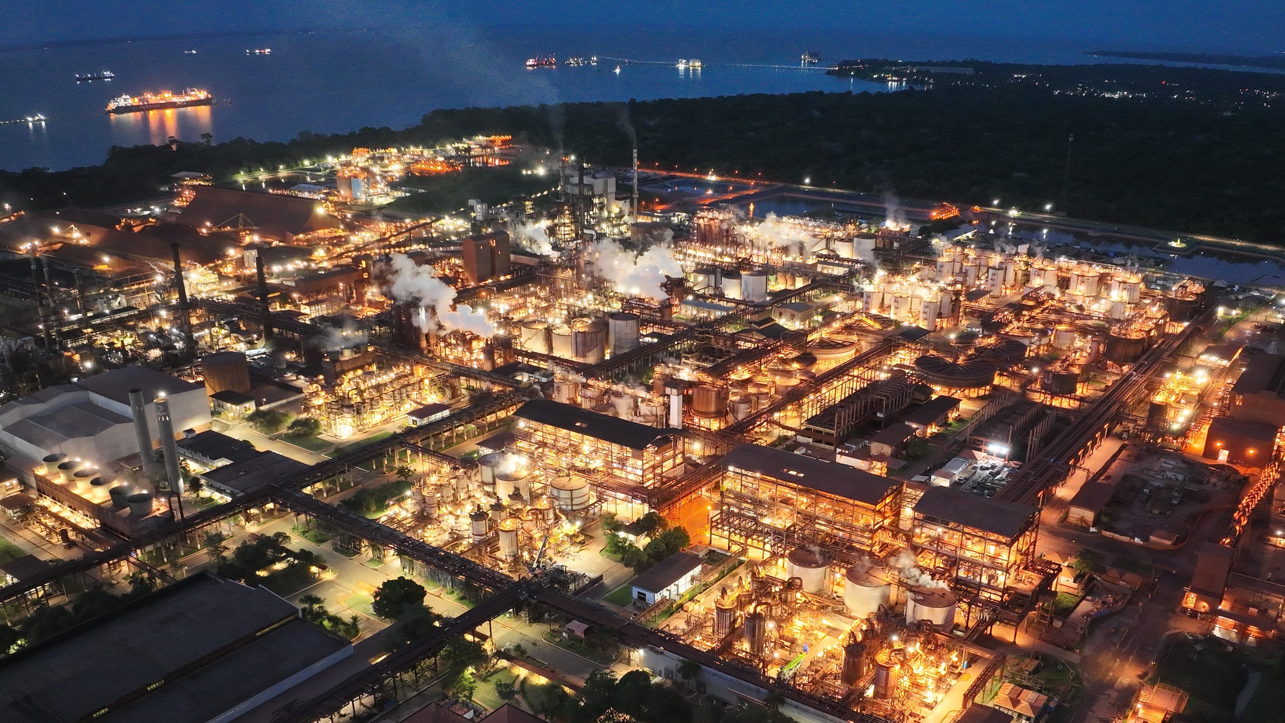 an aerial view of a factory at night