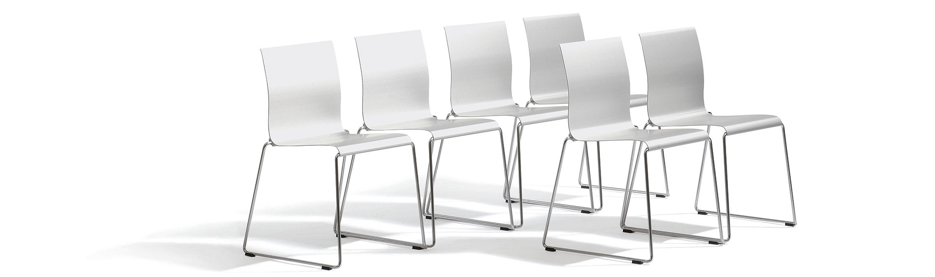 a group of white chairs