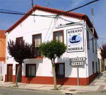 house with an old hydro logo mural