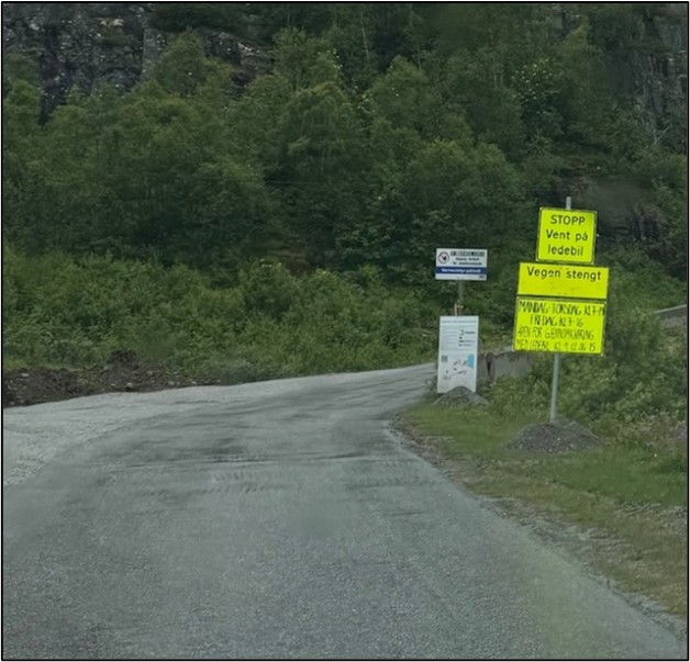 a road with signs on it
