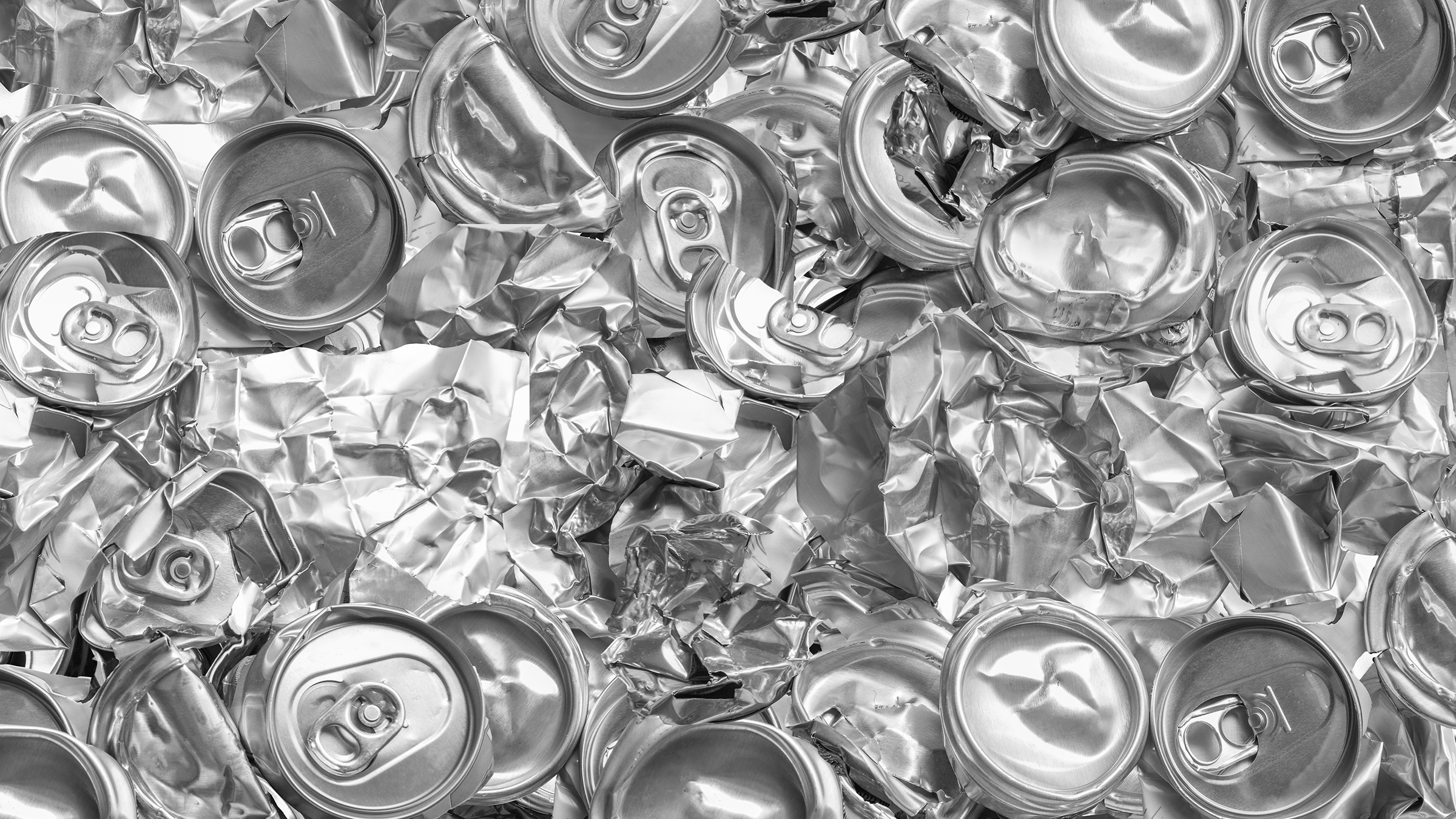a group of crushed cans