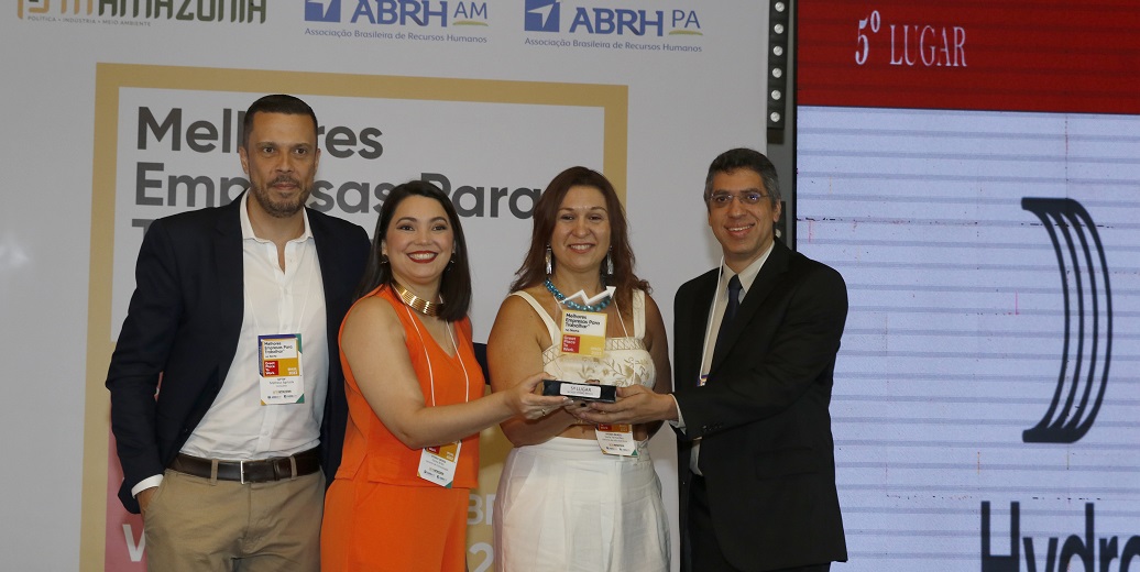 a group of people posing for a photo