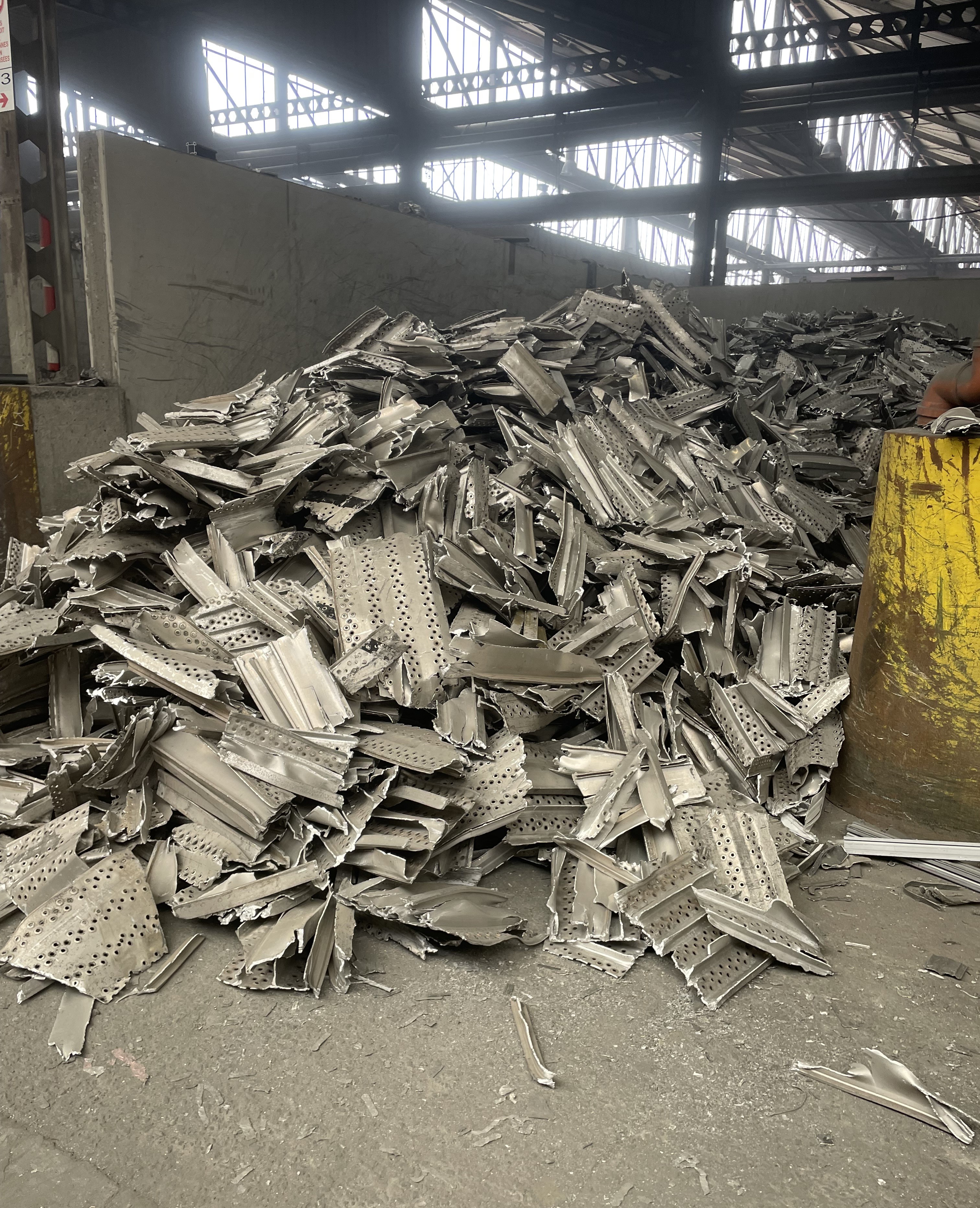 a pile of metal pieces in a large pile