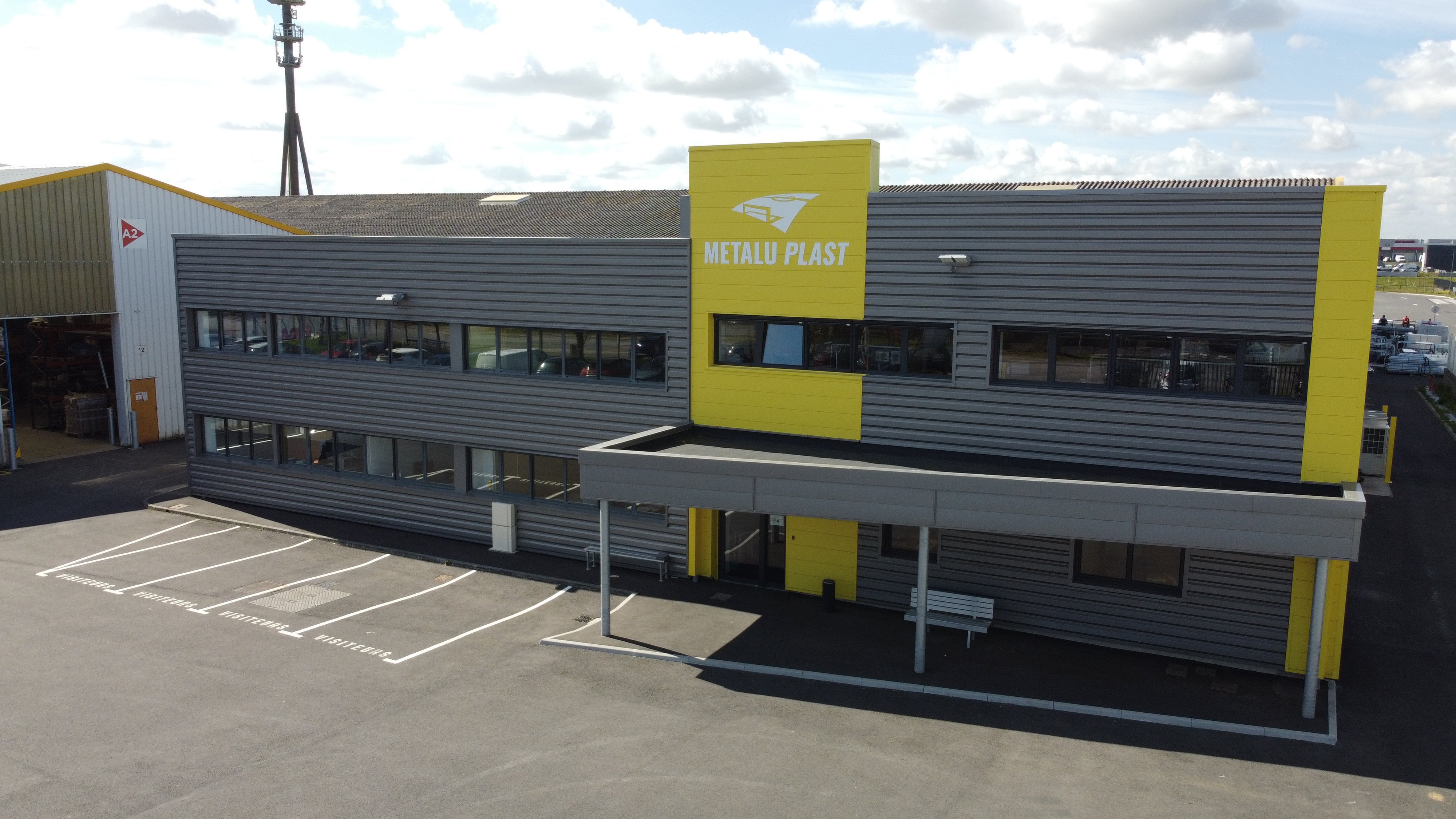 a building with a yellow sign