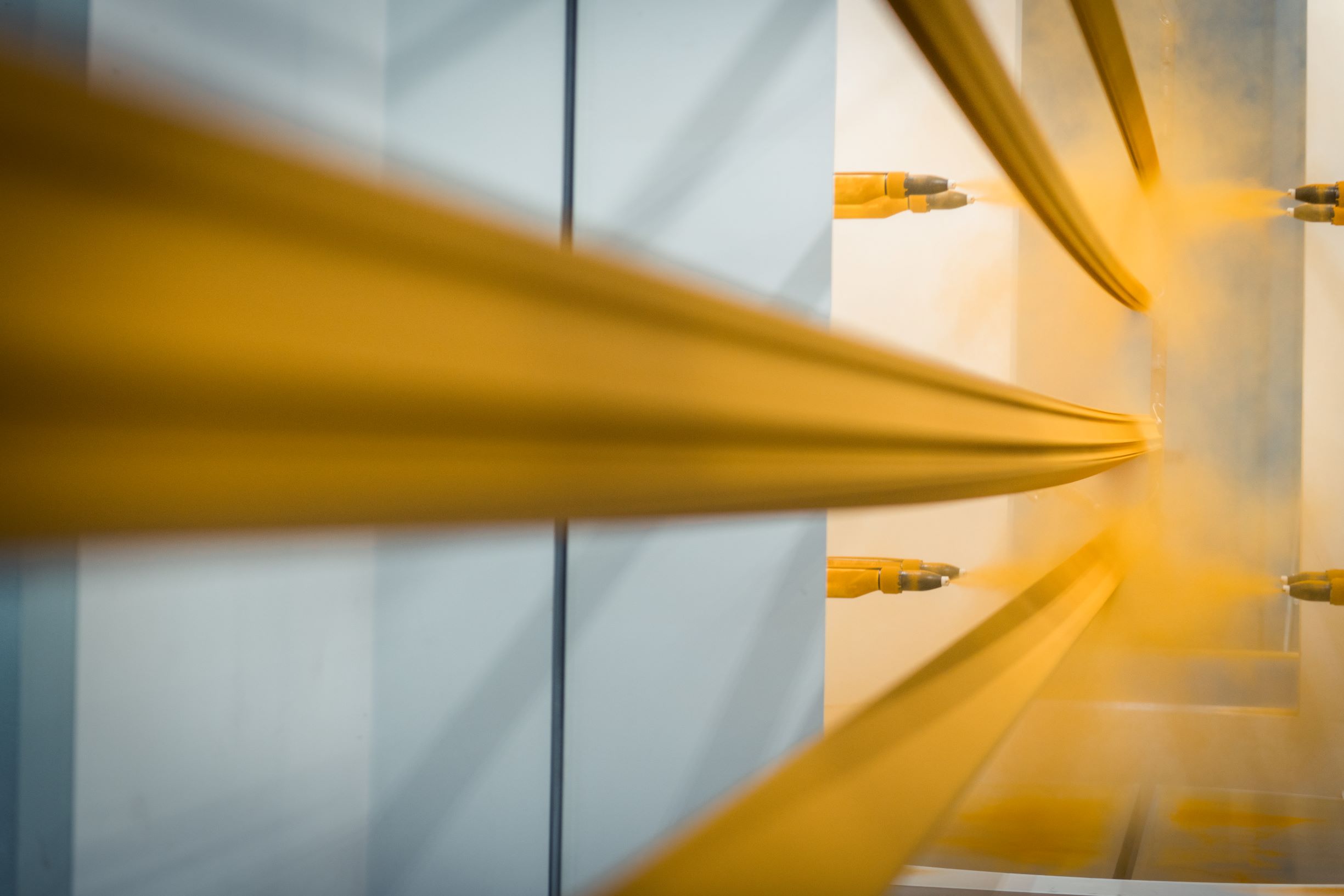 a yellow door with a glass window
