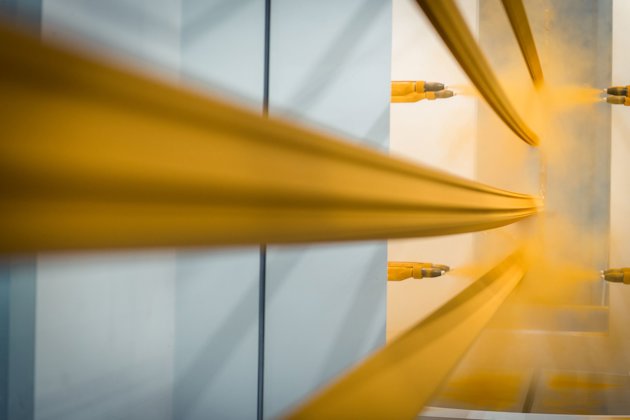 a yellow door with a glass window